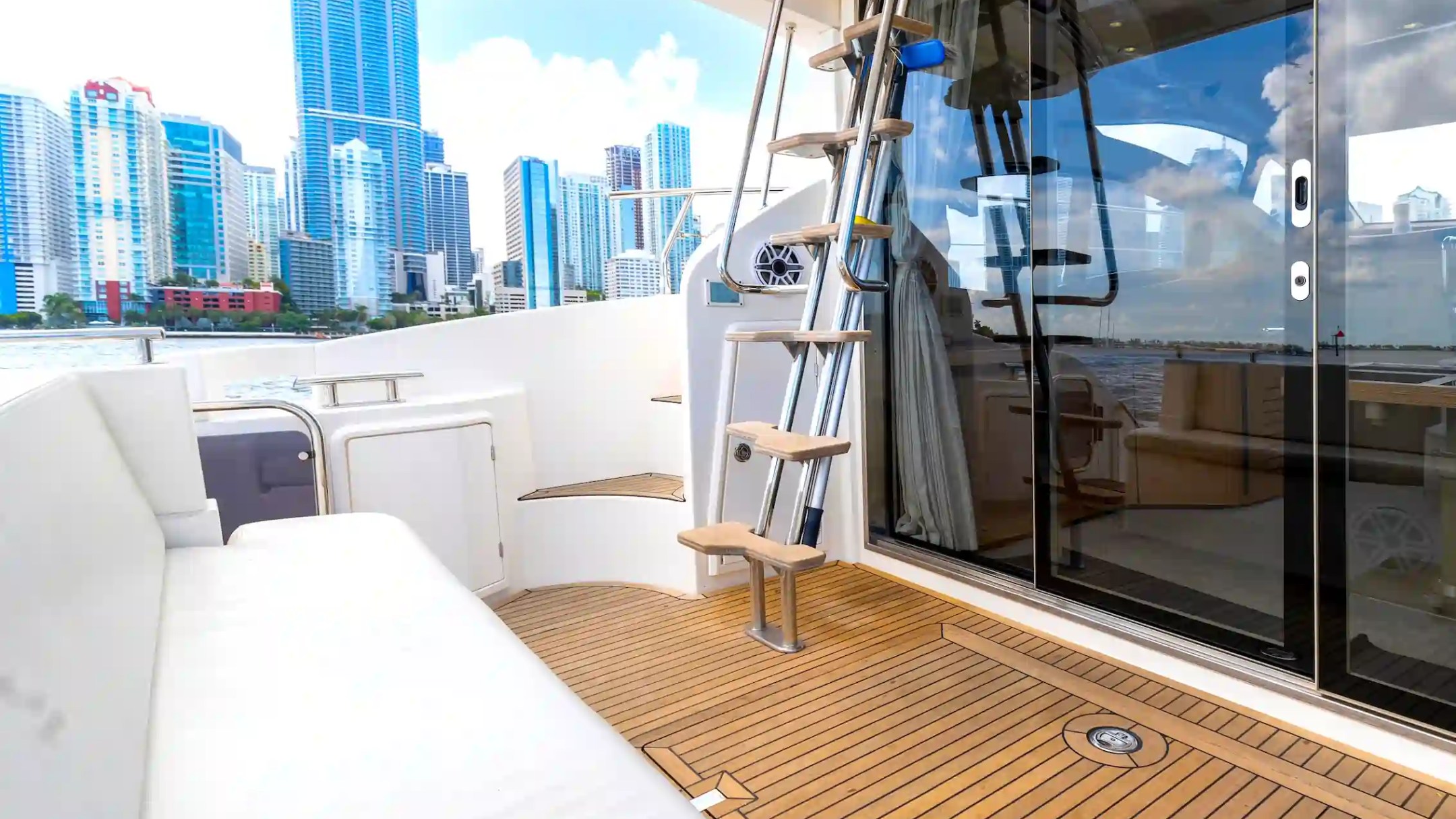 45' Azimut boat rental Miami aft deck teak cockpit skyline view