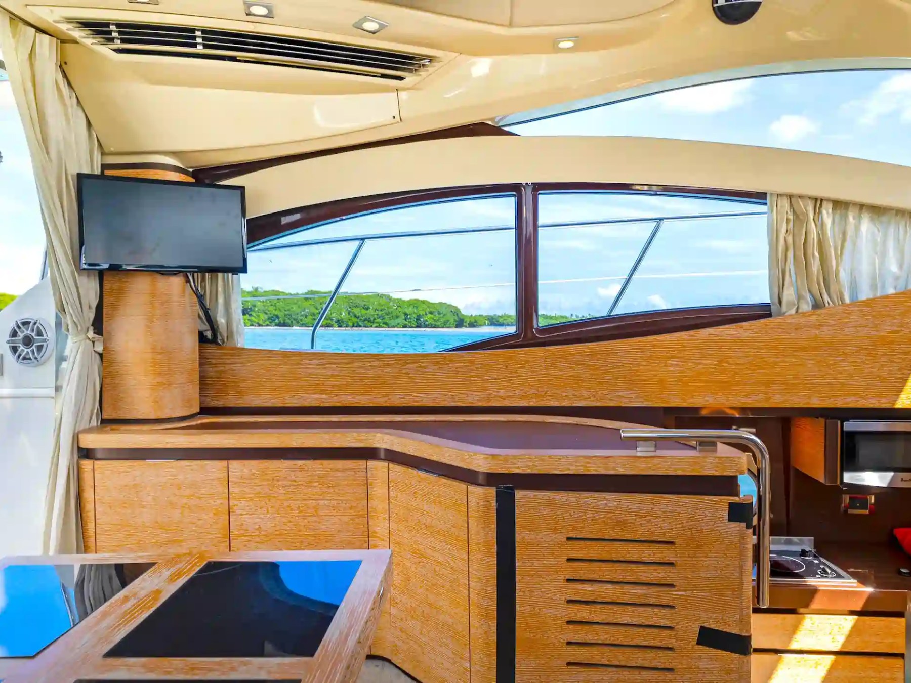 45' Azimut boat rental Hollywood salon interior galley and TV window view