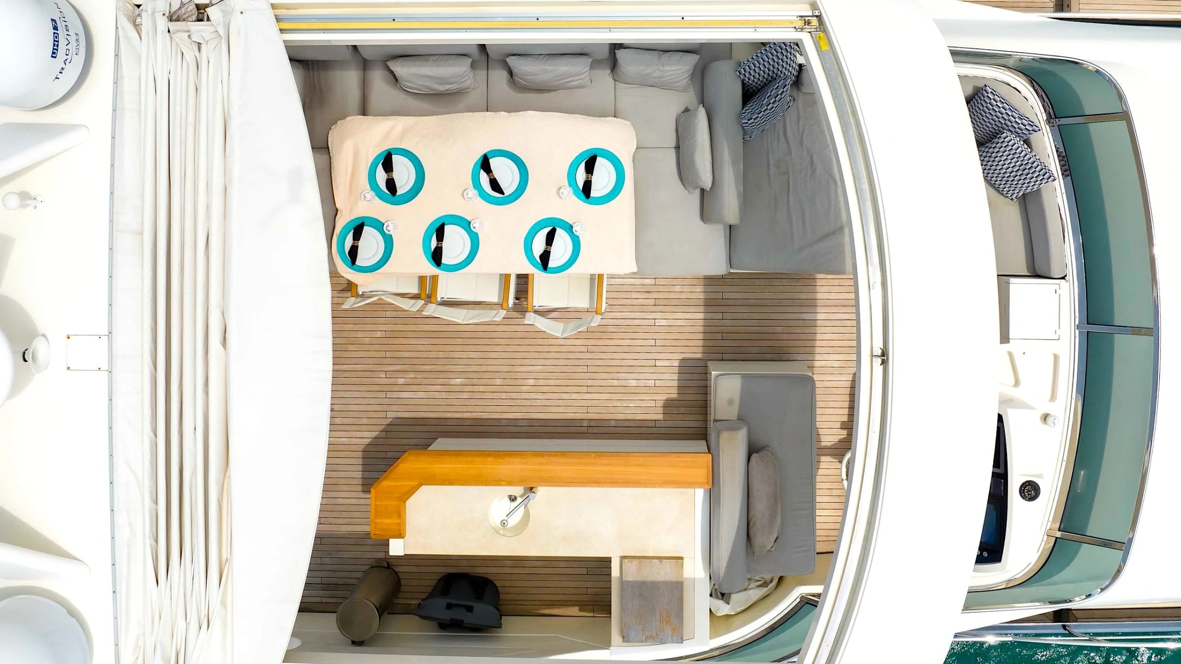 84' Azimut Yacht Charter viewed from an overhead perspective above the flybridge, showcasing alfresco dining seating, lounge areas, and open-air entertaining space in Biscayne Bay.