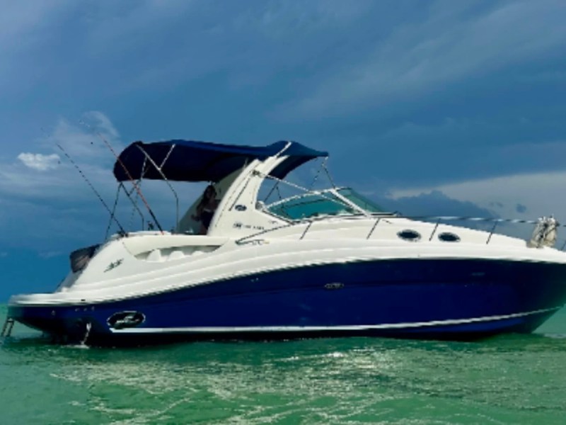 37' SeaRay Boat Rental anchored in the Gulf waters near Cape Coral.