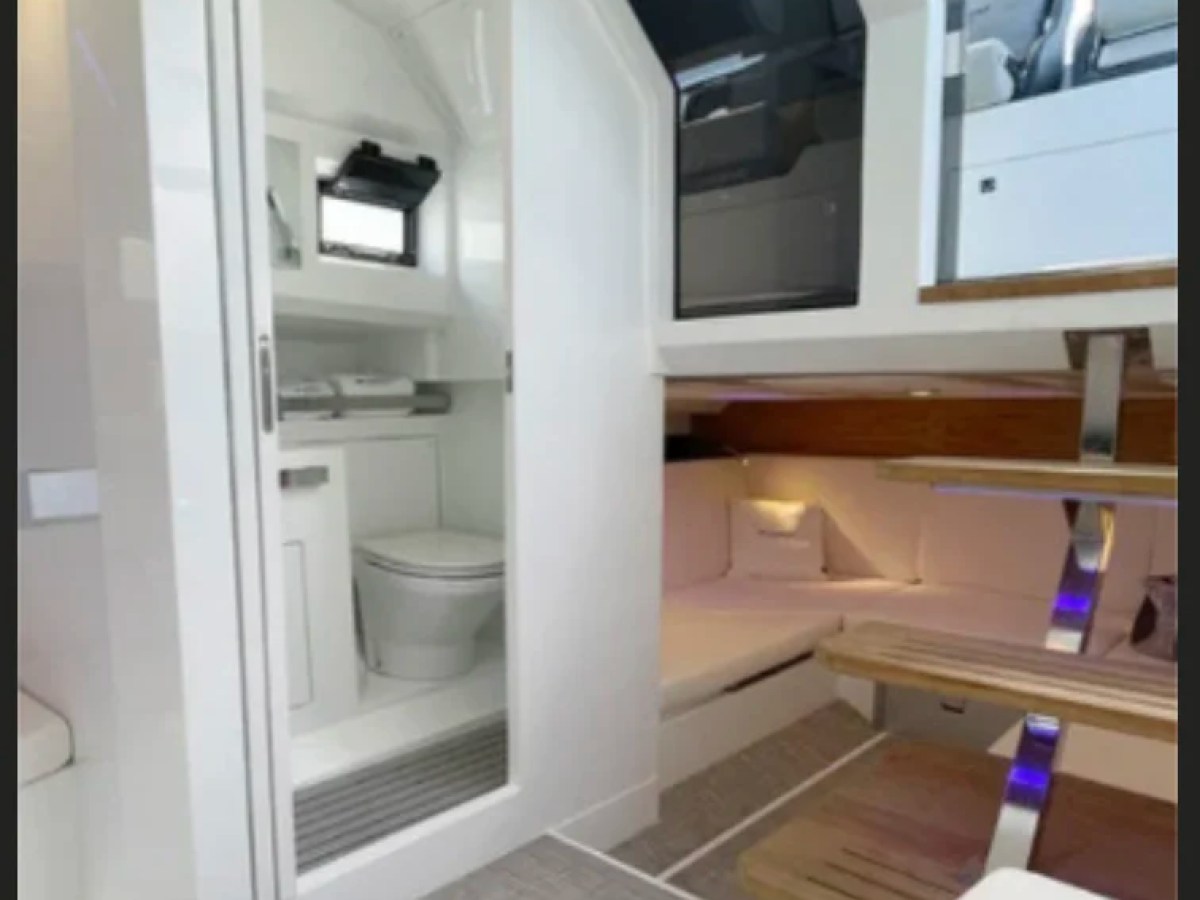 36' De Antonio Boat Rental private cabin and enclosed marine head in Delray Beach.