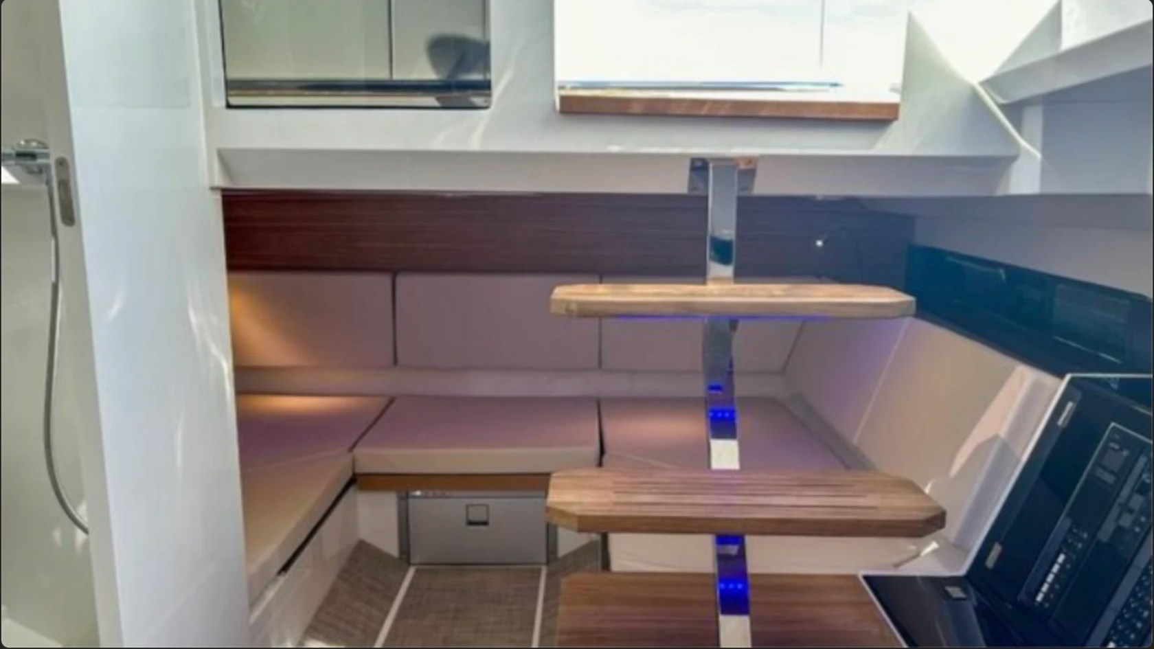 36' De Antonio Boat Rental modern cabin lounge with convertible seating in Delray Beach.