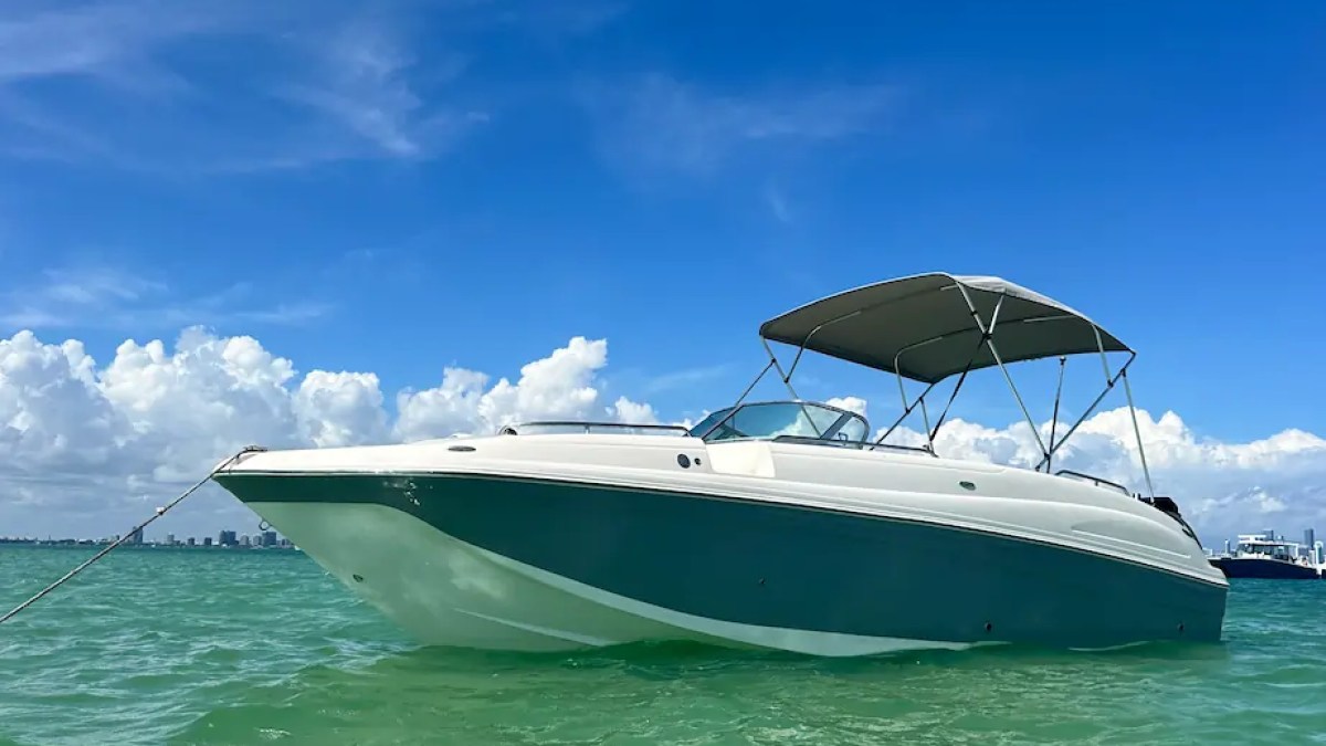 30' Hurricane Boat Rental anchored in the crystal-clear waters of Biscayne Bay in Miami.