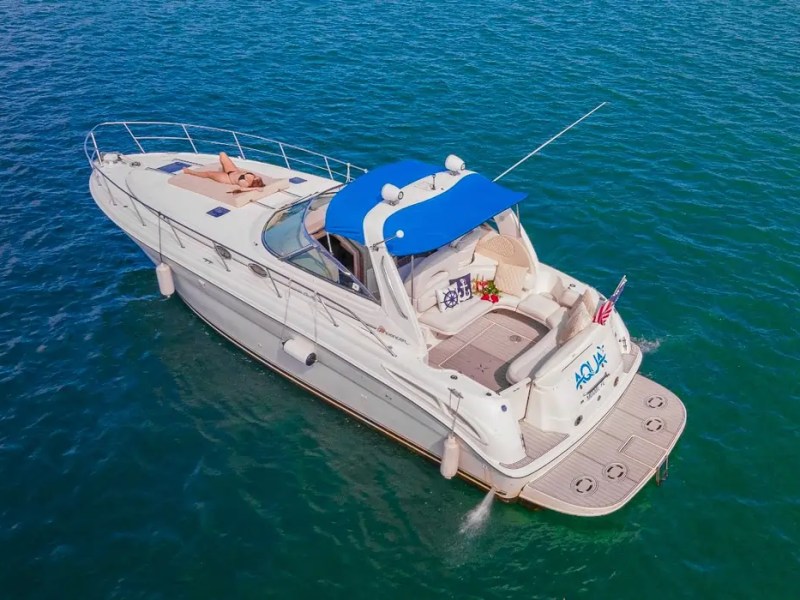 45' SeaRay Boat Rental aerial drone view cruising Biscayne Bay in Miami.