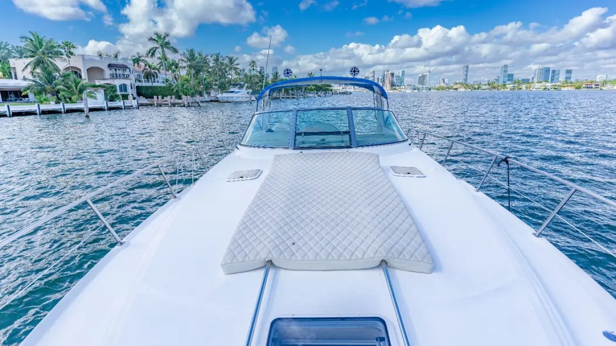 45' SeaRay Boat Rental bow sun pad with Biscayne Bay views in Miami.