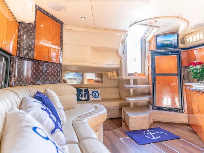 45' SeaRay Boat Rental luxury salon with galley and lounge seating in Miami.