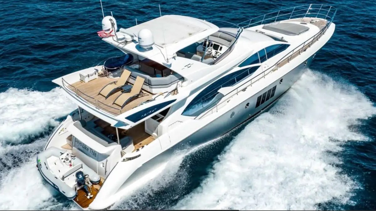 70' Azimut Yacht Charter aerial view showcasing the luxury flybridge while cruising in Miami.