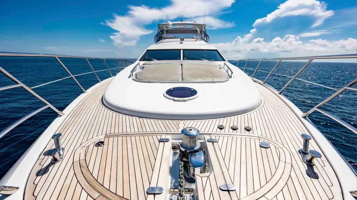 70' Azimut Yacht Charter foredeck with expansive teak walkways, sun pad and open ocean views in Miami.