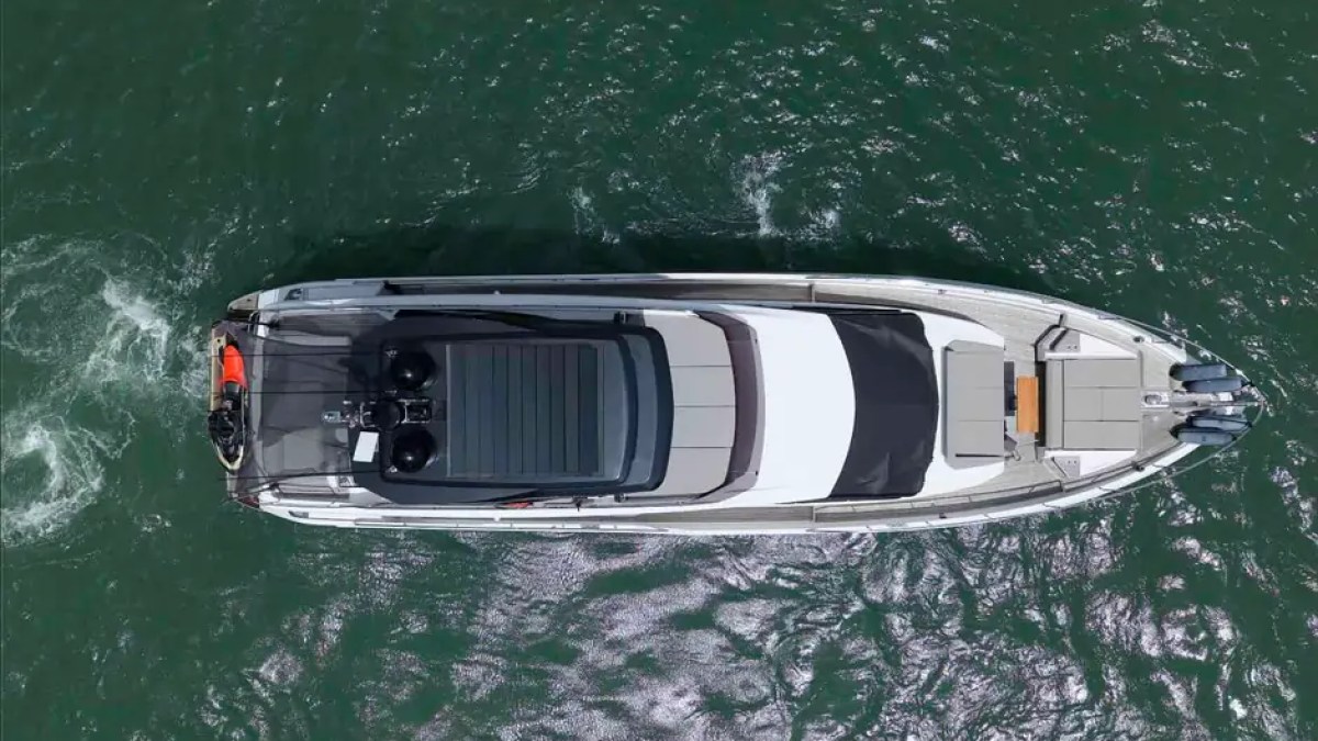 80' Ferretti Yacht Charter aerial top view cruising on Biscayne Bay in Miami.