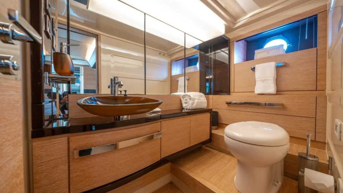 66' Azimut Yacht Charter luxury ensuite bathroom with designer vanity in Miami Beach.