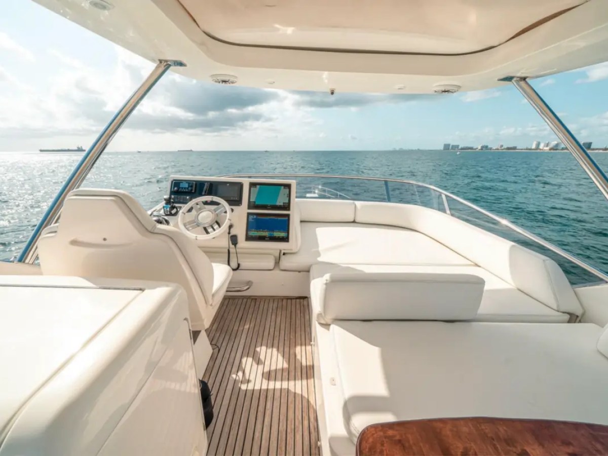 66' Azimut Yacht Charter flybridge helm with panoramic Atlantic Ocean views in Miami Beach.