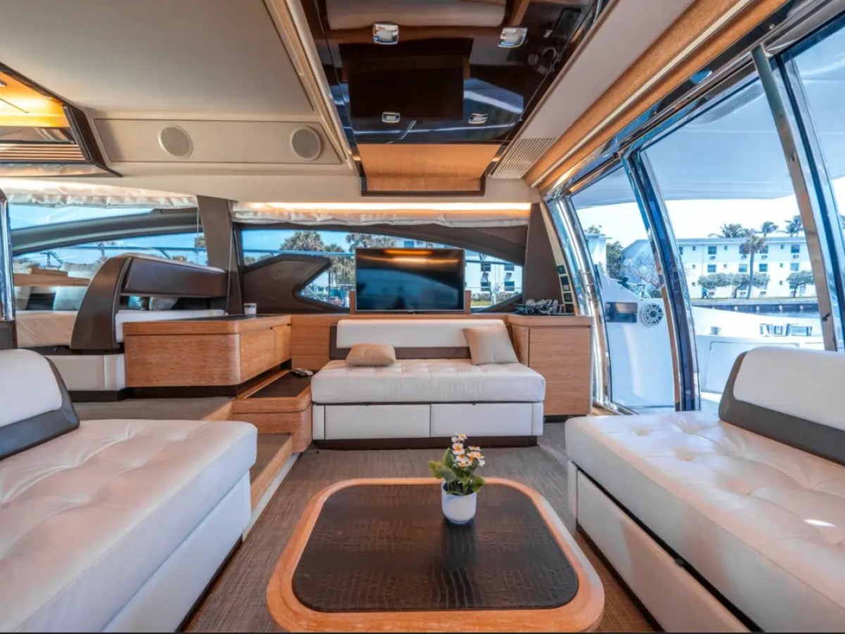66' Azimut Yacht Charter luxury salon with panoramic windows in Miami Beach.