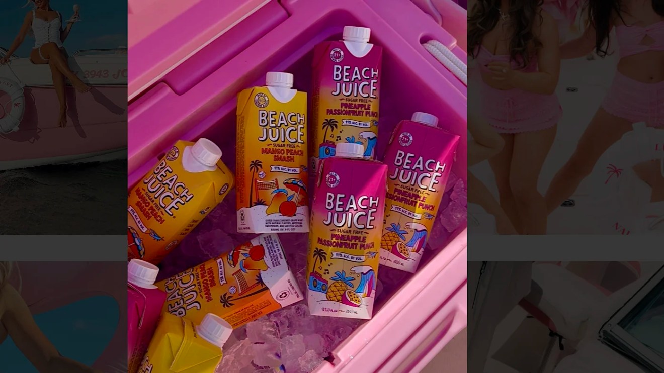 Pink cooler stocked with colorful party drinks for a 26' Hurricane Boat Rental celebration in Riviera Beach, Florida.