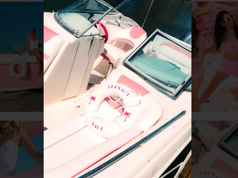 Pink and white cockpit seating aboard a 26' Hurricane Boat Rental in Riviera Beach, Florida.
