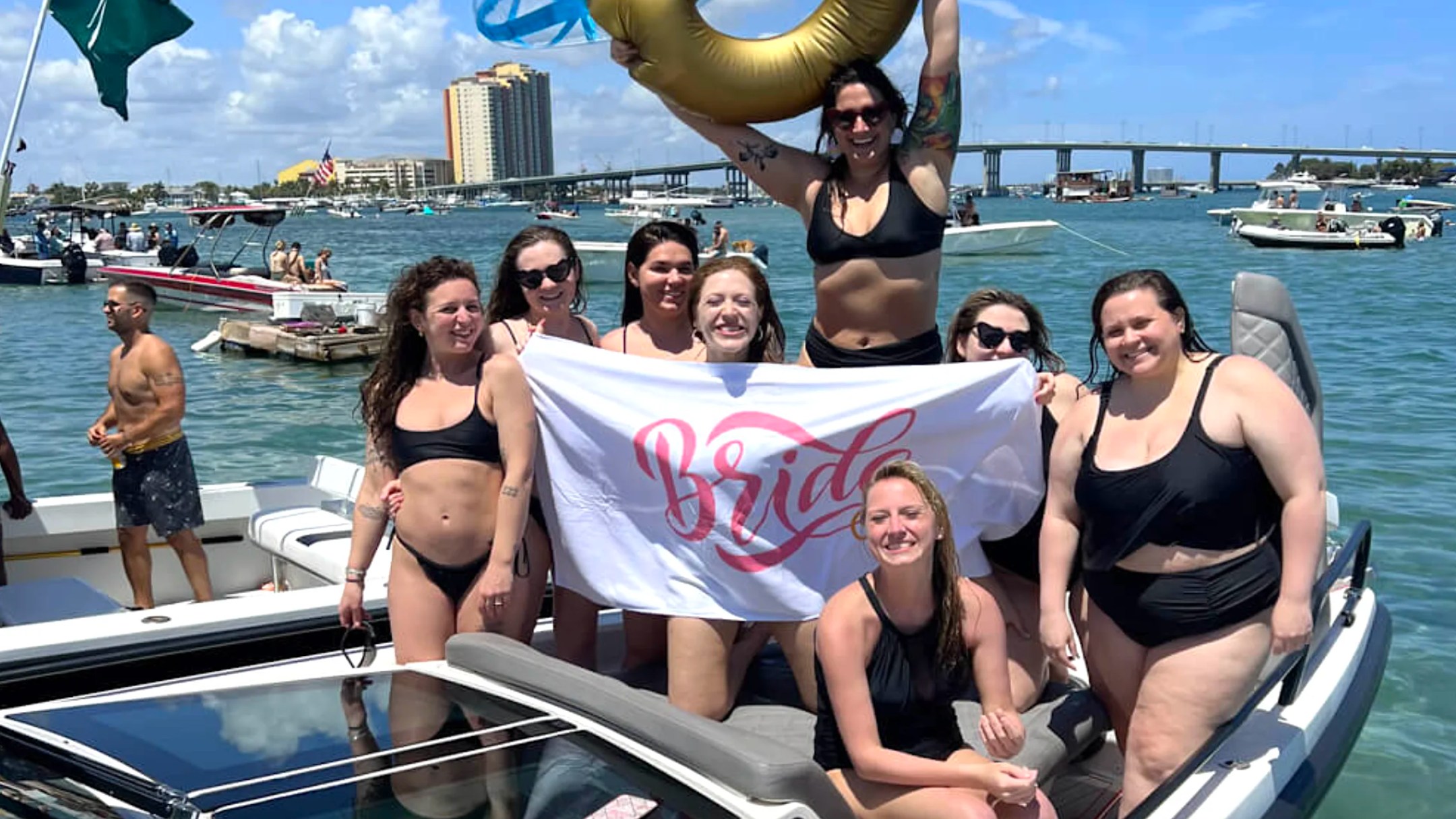 Bachelorette party celebrating aboard a 37' Axopar Boat Rental near Peanut Island in Riviera Beach.