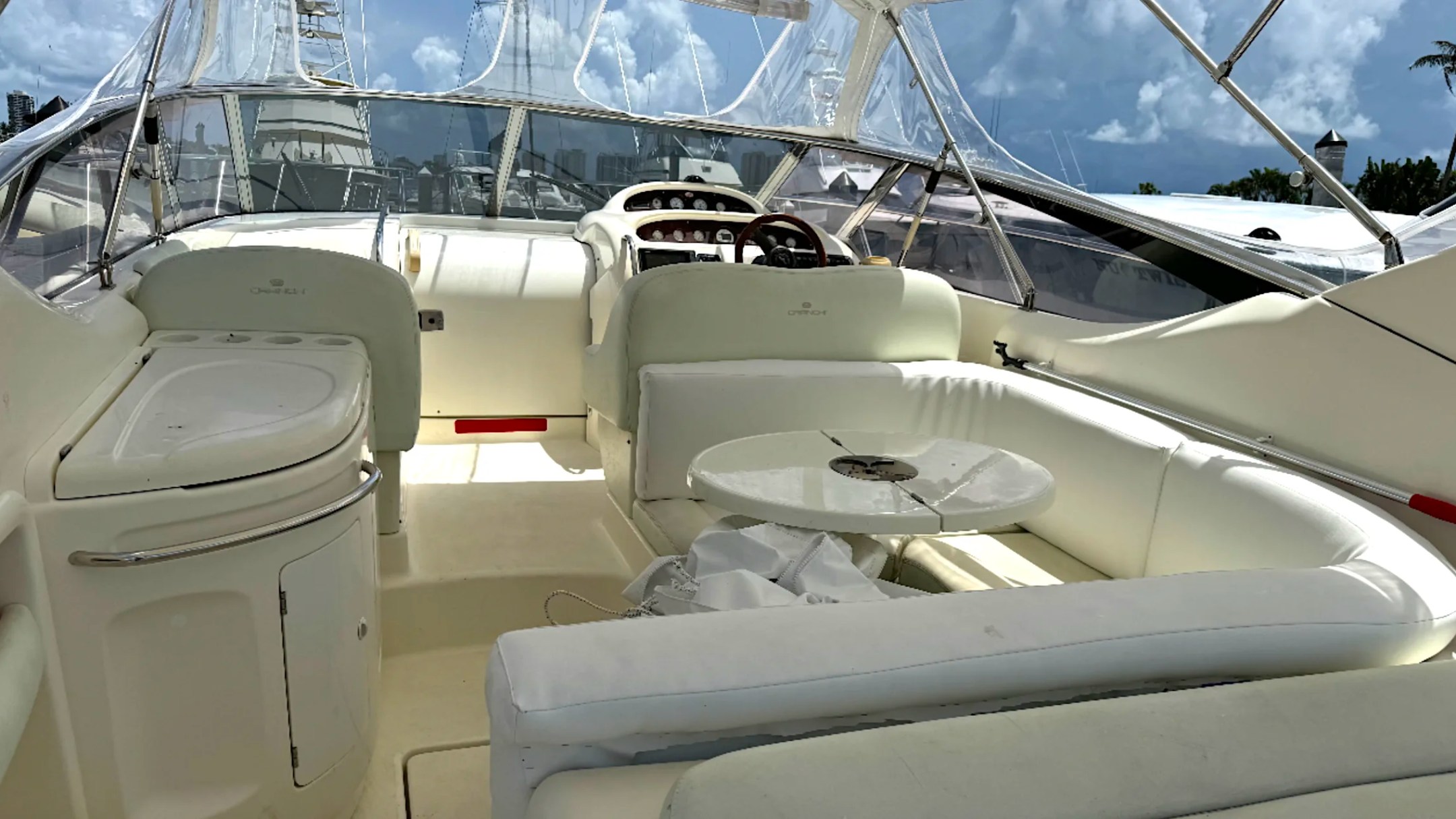 41' Cranchi Boat Rental cockpit seating with helm station and open-air lounge in Riviera Beach.