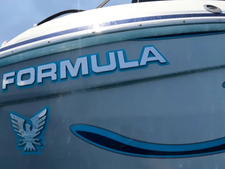 28' Formula Boat Rental hull branding in Boynton Beach Florida.