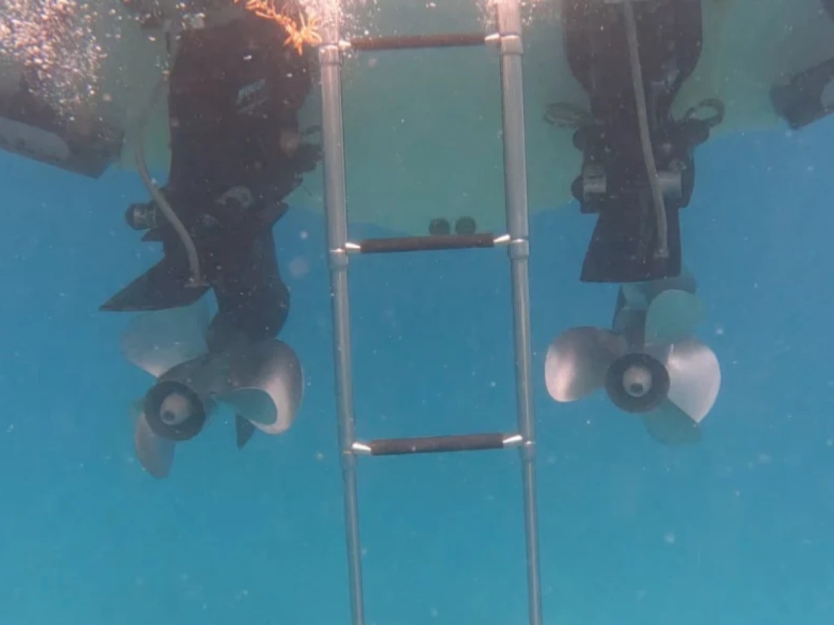 Underwater swim platform ladder on 28' Formula Boat Rental in Boynton Beach Florida.