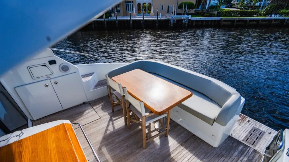 50' Beneteau Yacht Charter with spacious aft seating and teak dining area in Delray Beach Florida.