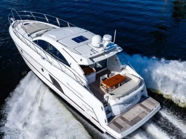 50' Beneteau Yacht Charter underway in Delray Beach Florida with a spacious aft deck and swim platform.