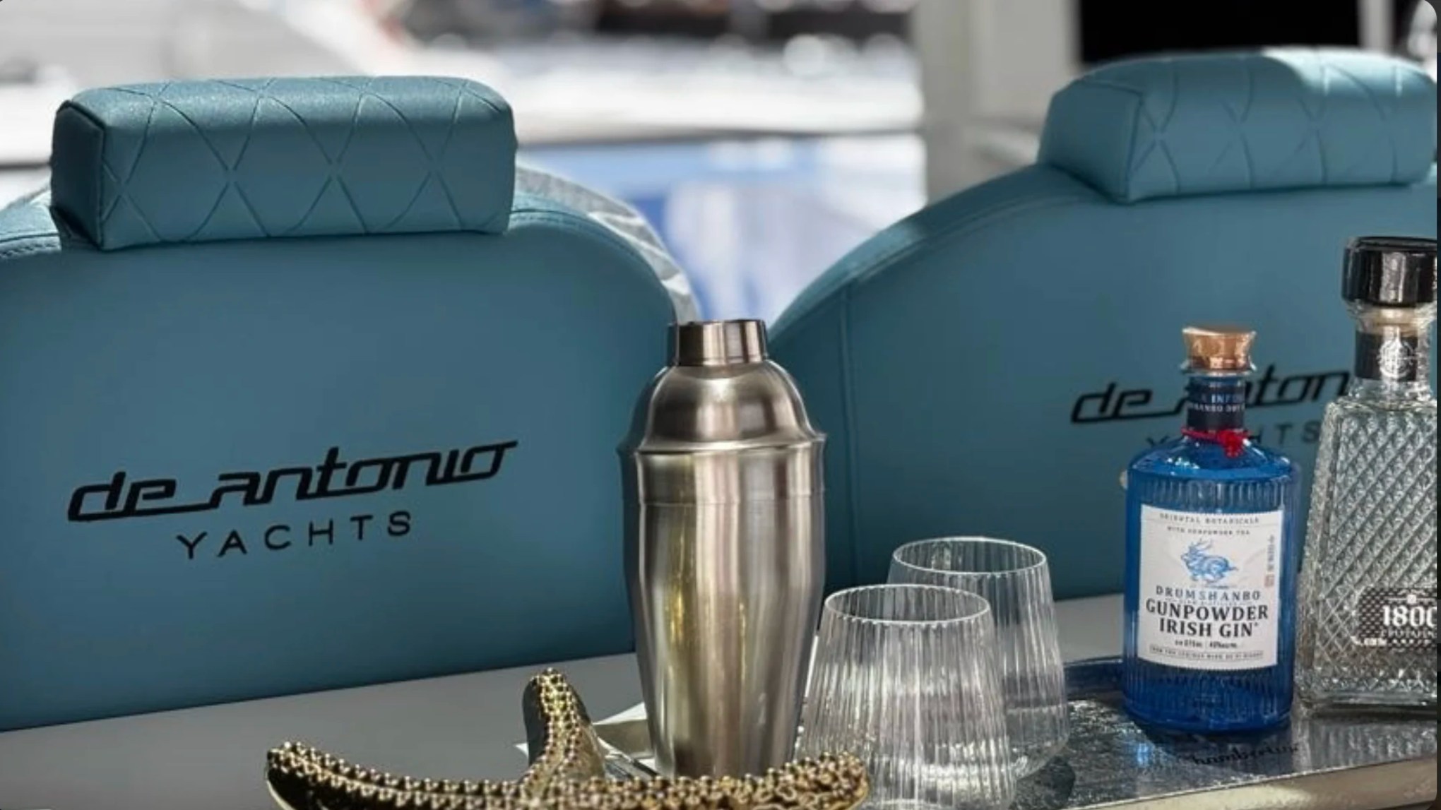 Close-up of the premium DeAntonio Yachts helm seating and cocktail setup aboard a 50' DeAntonio Yacht Charter in Palm Beach showcasing upscale finishes and modern luxury styling.