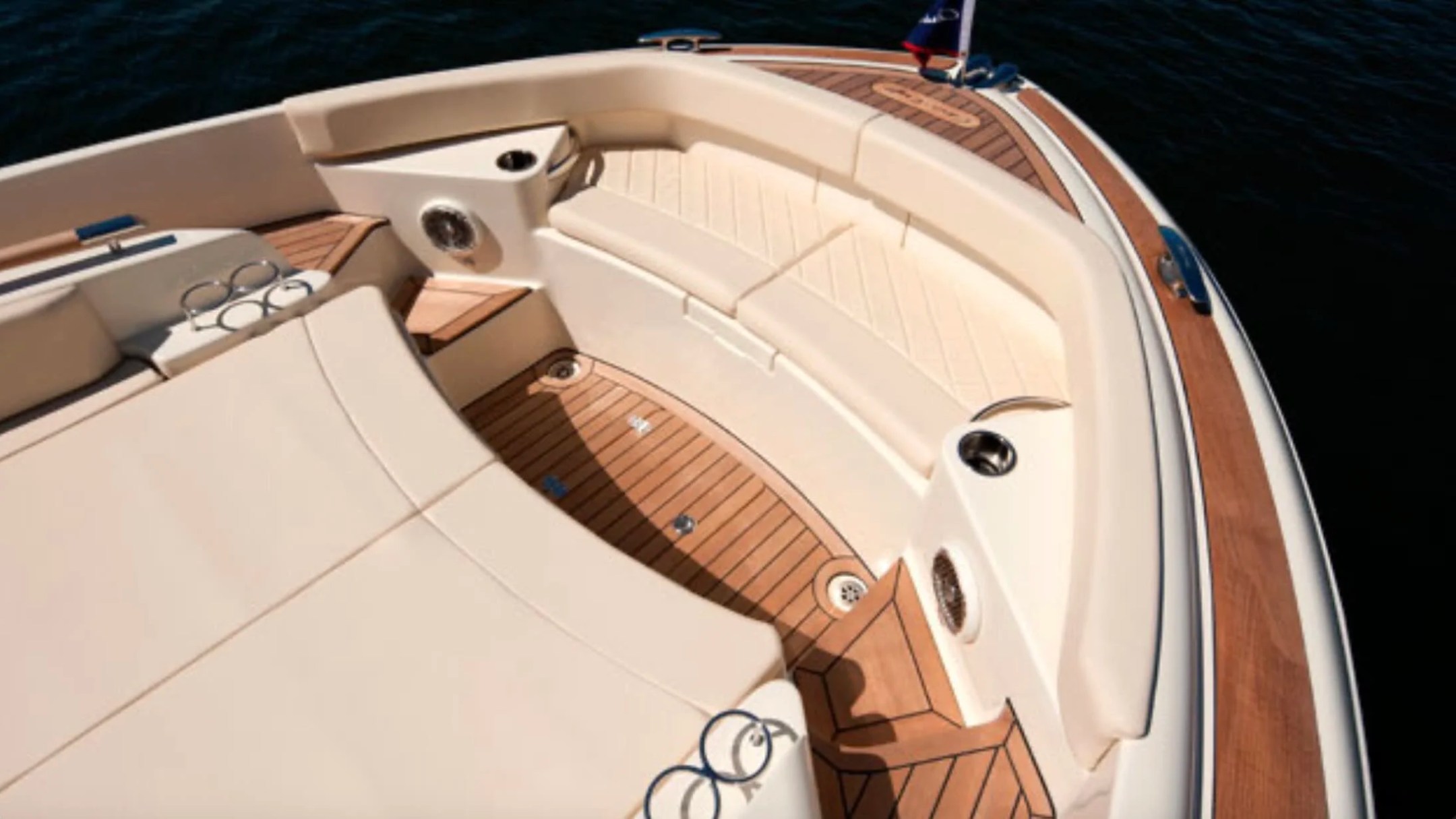 38' Chris-Craft Boat Rental featuring comfortable bow seating with premium wraparound lounge and teak decking in Riviera Beach.