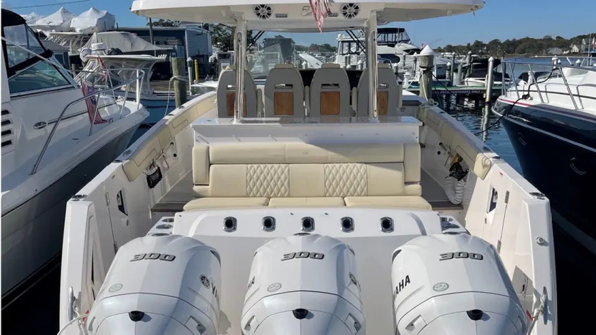 38' Regal Boat Rental spacious aft cockpit with triple Yamaha outboards in Riviera Beach Florida.