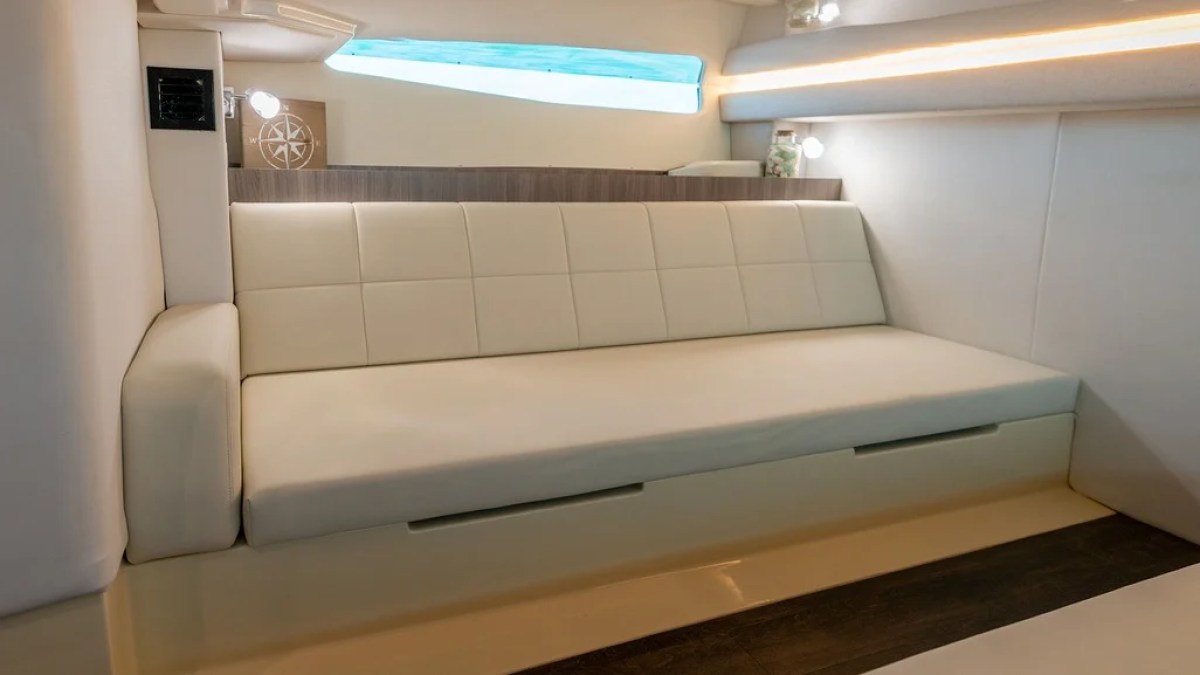 38' Regal Boat Rental convertible cabin lounge with premium seating in Riviera Beach Florida.