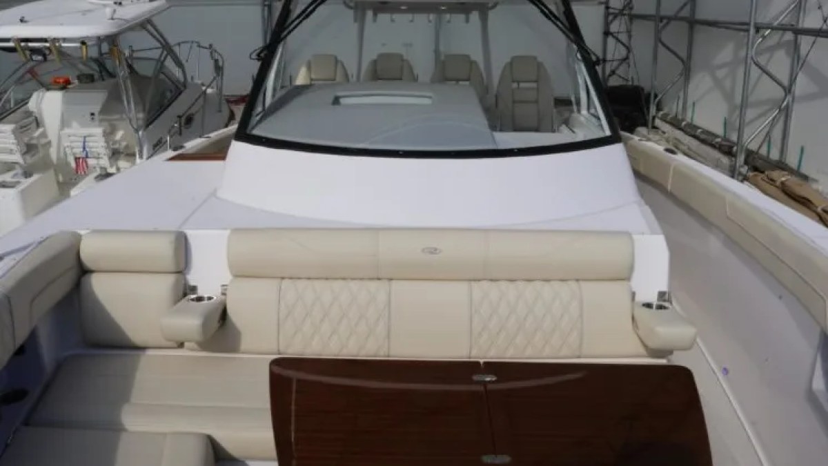38' Regal Boat Rental forward cockpit lounge with premium seating in Riviera Beach Florida.