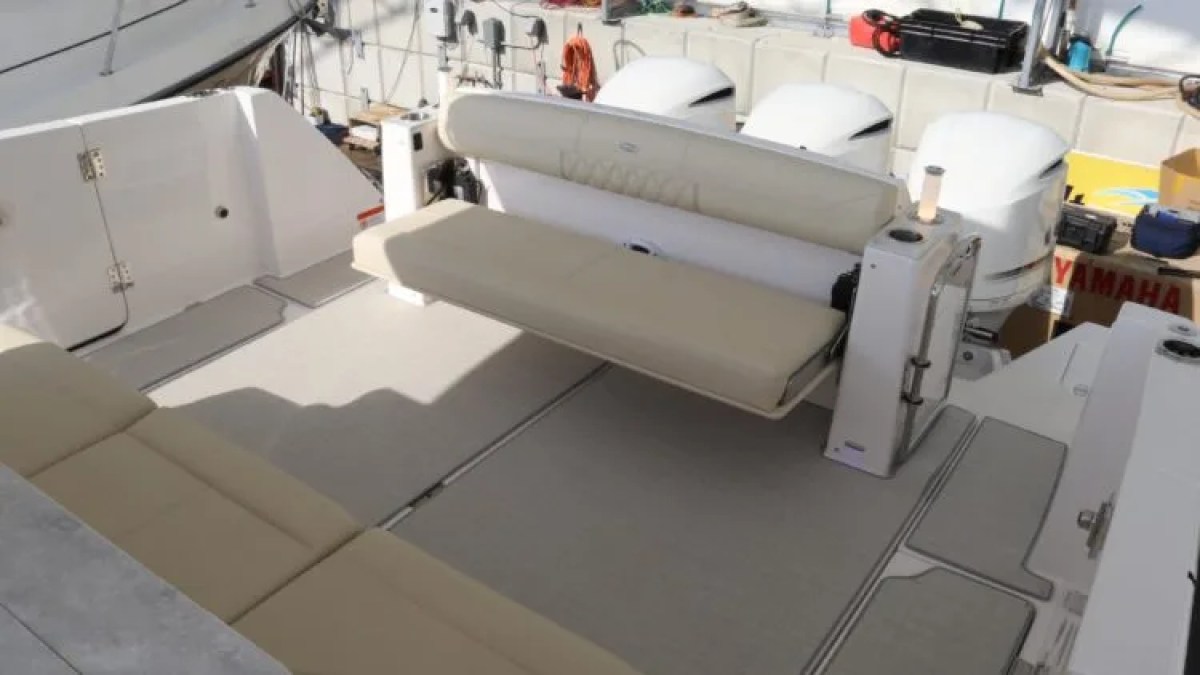 38' Regal Boat Rental fold-down transom bench and swim platform in Riviera Beach Florida.