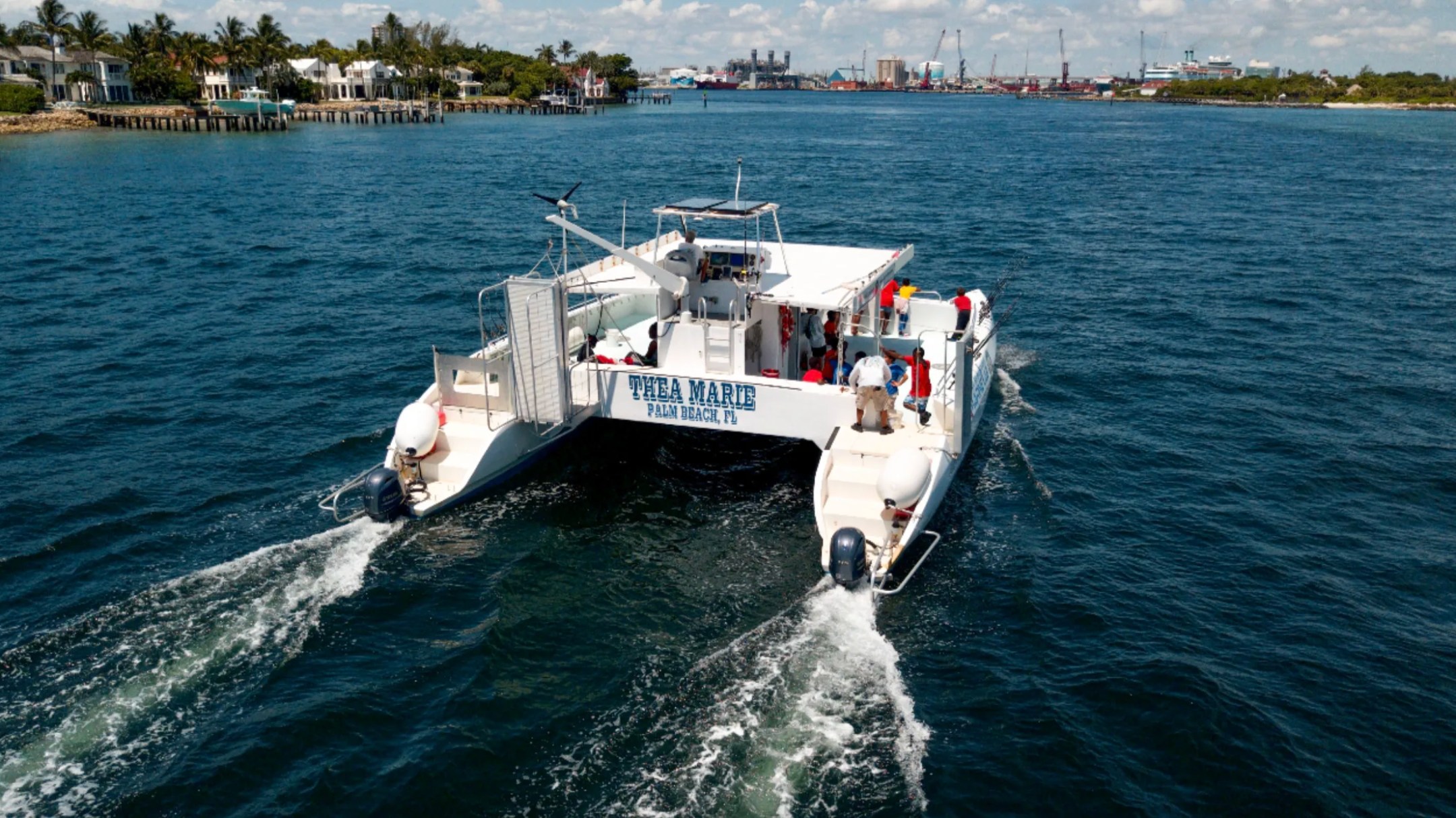49' PowerCat Boat Rental cruising the Intracoastal Waterway in Riviera Beach Florida.