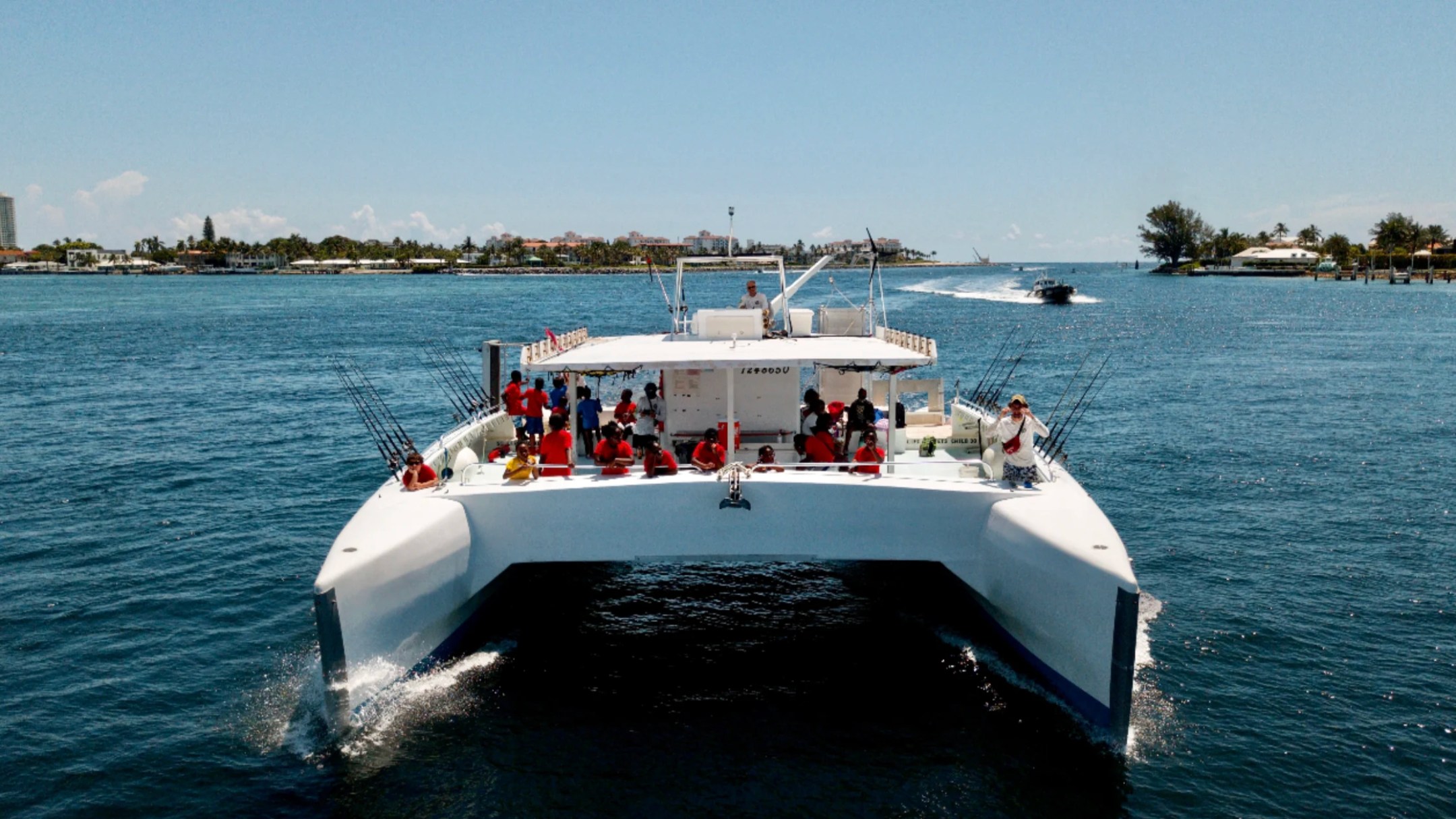 49' PowerCat Boat Rental cruising the Intracoastal Waterway in Riviera Beach Florida.