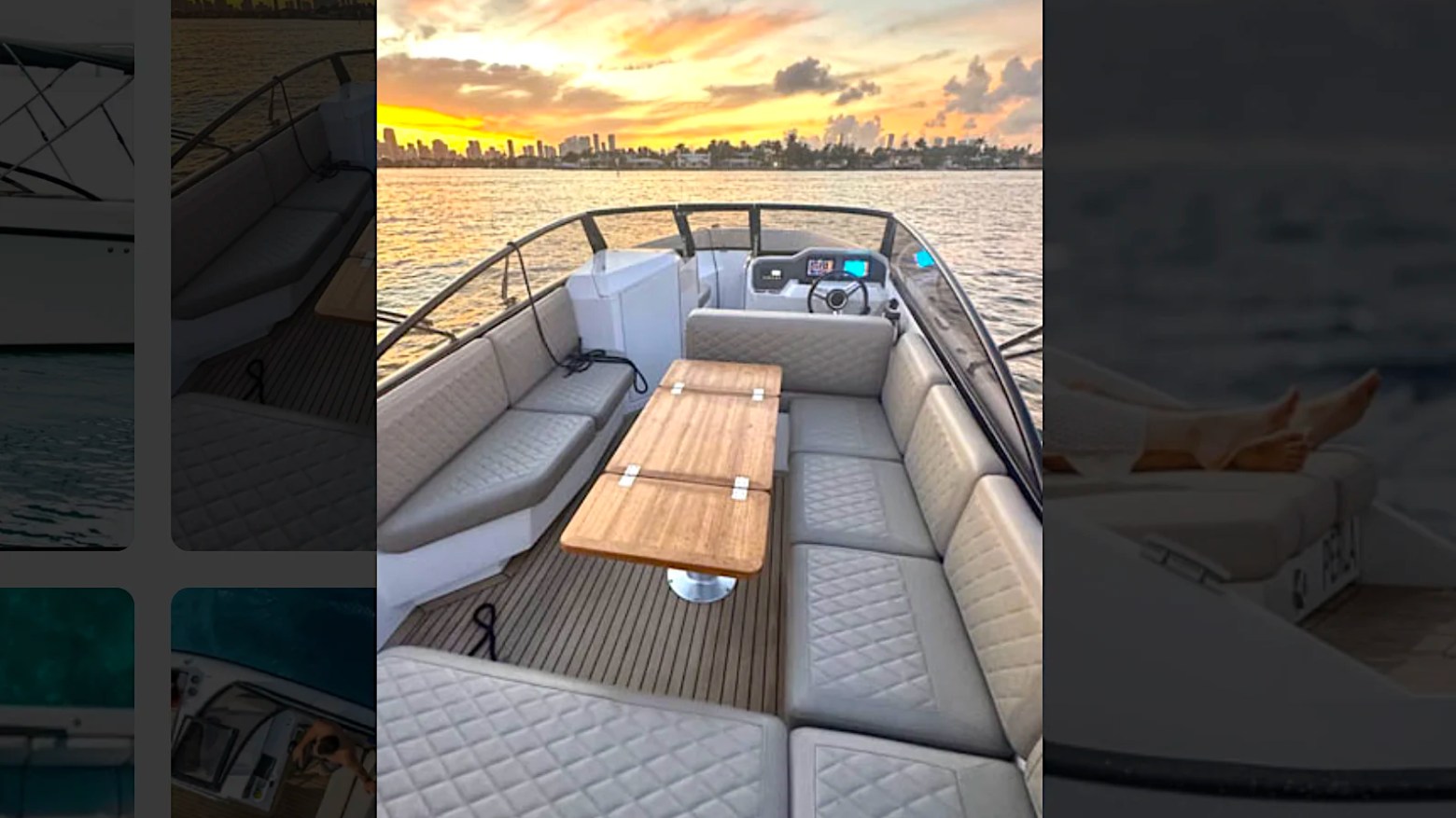 Spacious cockpit lounge and dining area aboard a 29' RAND Boat Rental during a sunset boating adventure.