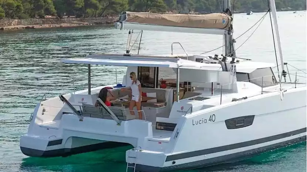 40' Fountaine Pajot Boat Rental with spacious shaded aft cockpit and waterfront dining area.