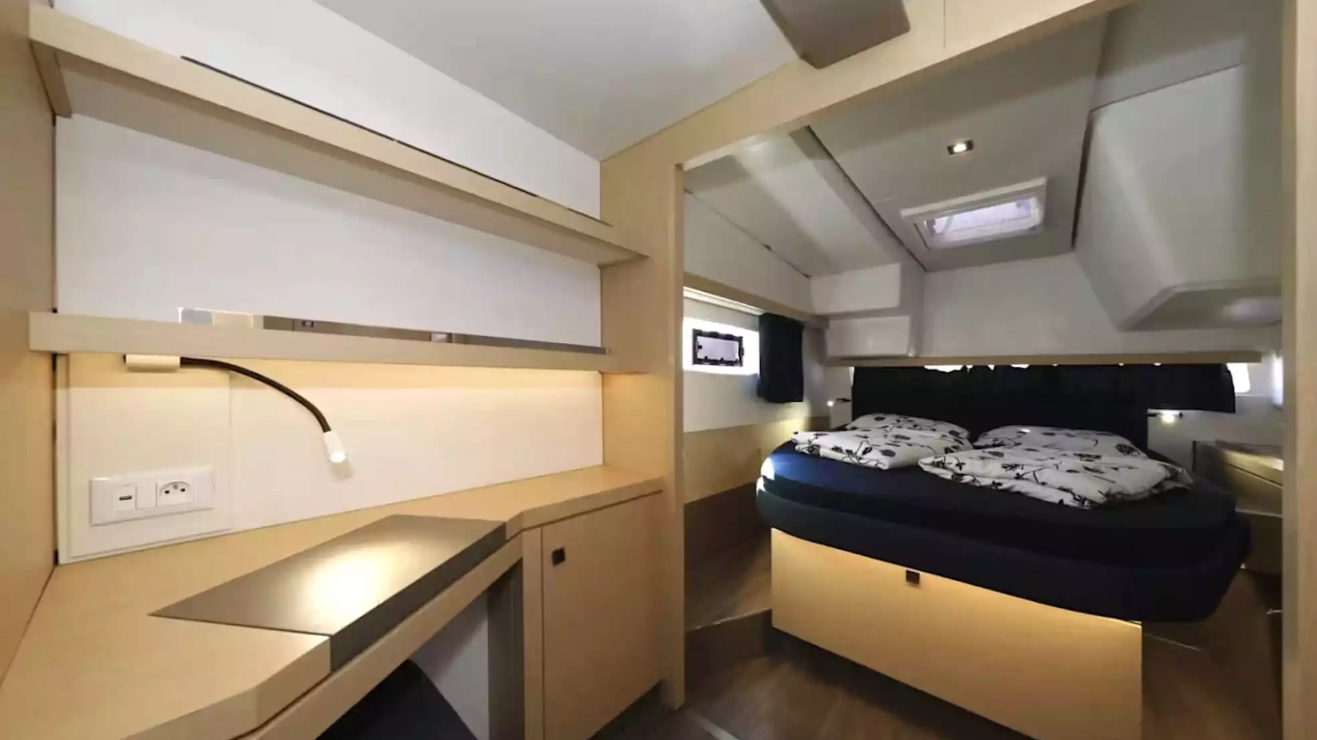 40' Fountaine Pajot Boat Rental with private stateroom, queen berth and modern cabin interior.