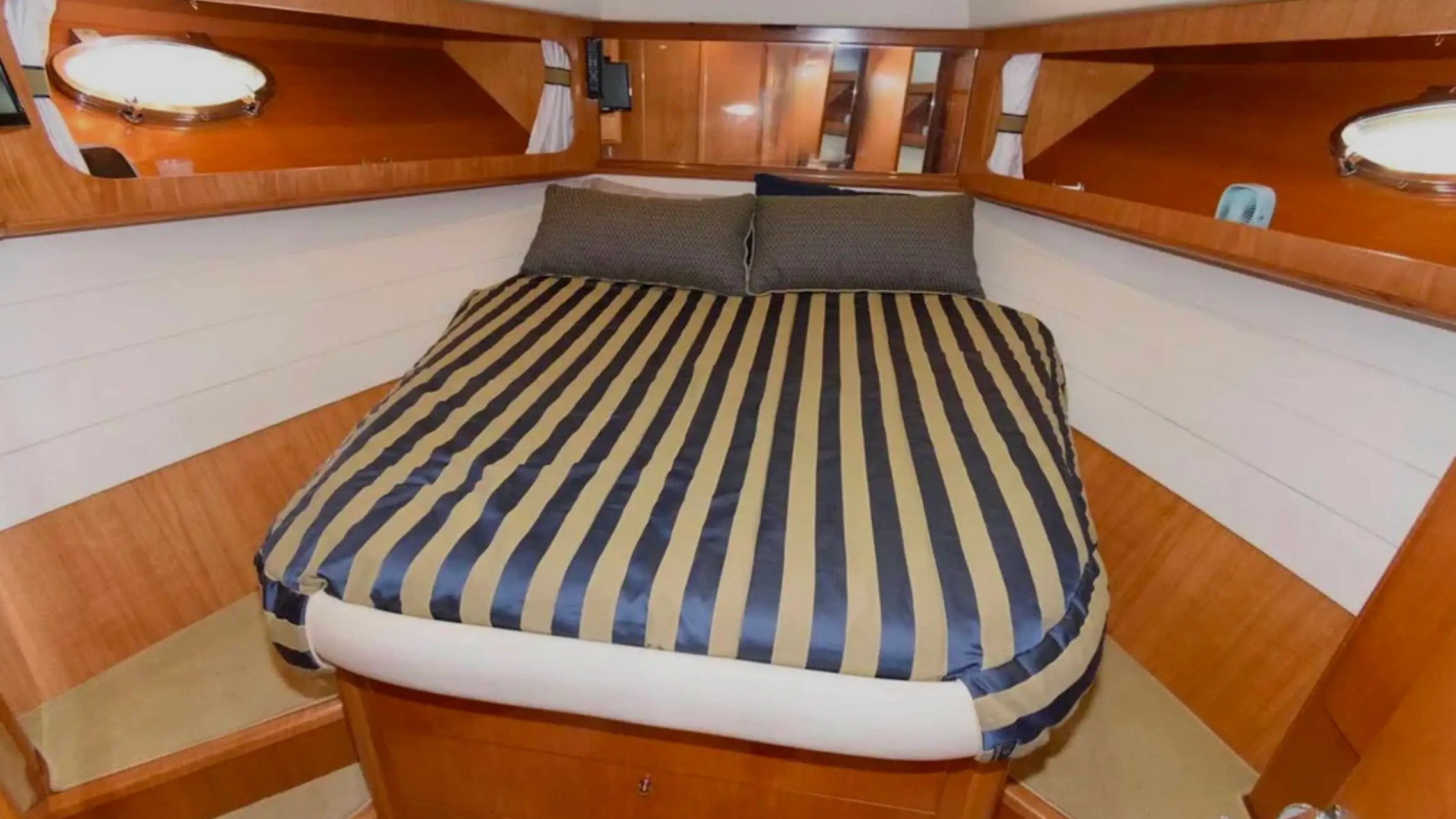 44' Uniesse Boat Rental with private master stateroom and double berth in Naples, Florida.