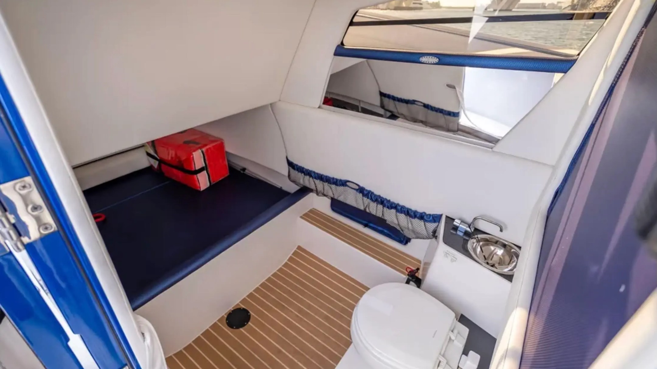 Nor-Tech Boat Rental with private cabin, marine toilet, sink and cushioned berth for added comfort on Florida waters.